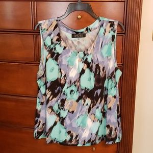Sleeveless shirt, worn once. Great with capri's